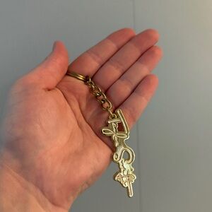 Taylor Swift Signature Logo Keychain – Metallic Gold